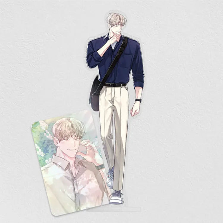 Between The Lines BL Acrylic Standee featuring a stylish male character in navy shirt and beige pants with a matching card