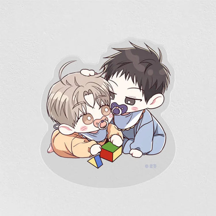 Between The Lines Mini Acrylic Stands featuring two chibi babies playing with colorful blocks on gray background