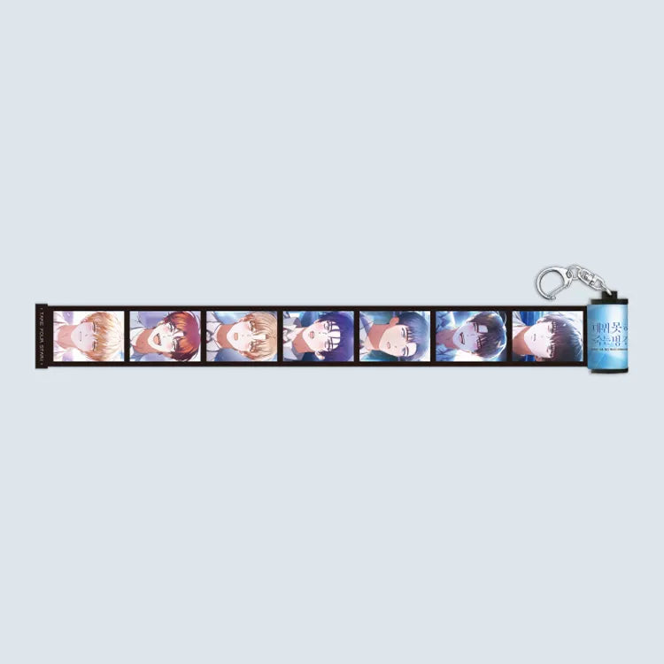 Debut or Die Film Roll Keychain featuring anime character portraits on film strip design