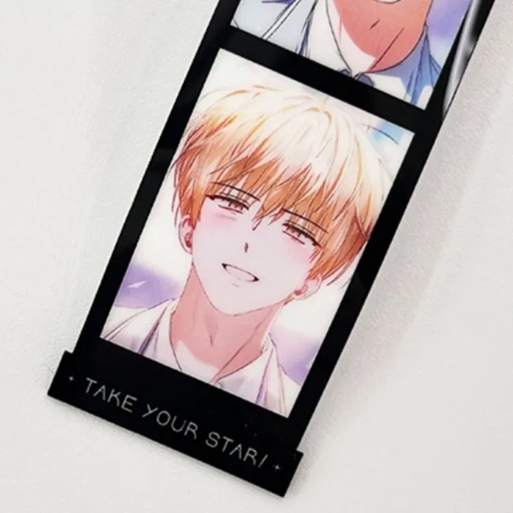 Debut or Die Film Roll Keychain featuring anime character with blonde hair and text Take Your Star