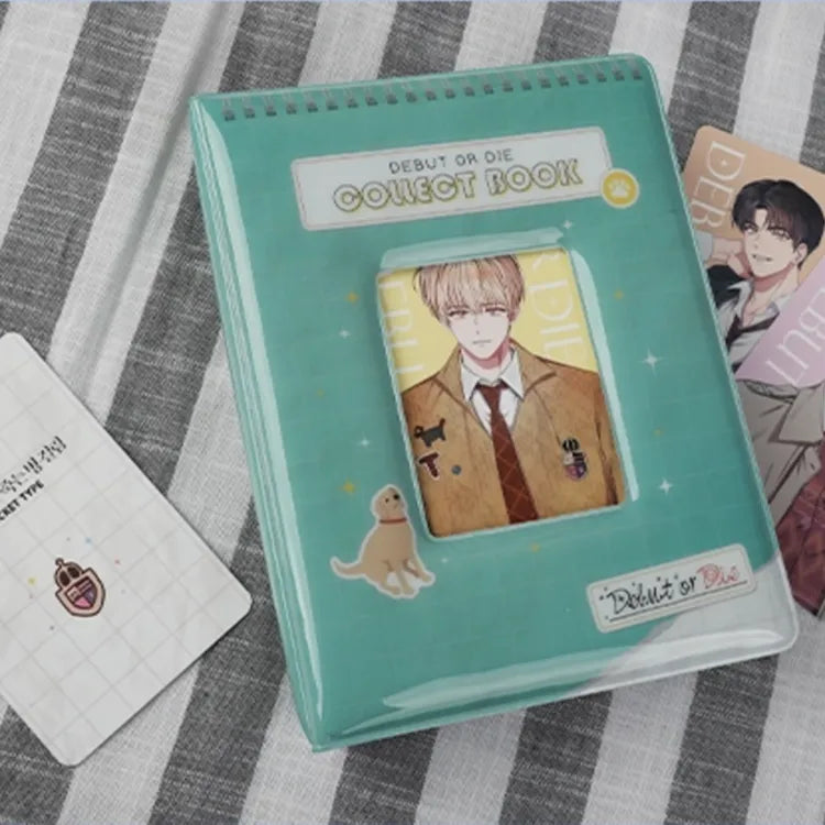 Black Debut or Die Photocard Binder open displaying an anime photocard with a smiling blond character