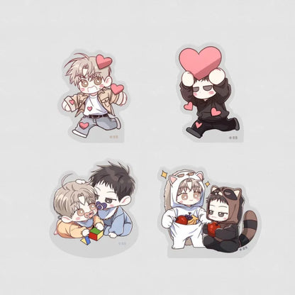 Between The Lines Mini Acrylic Stands featuring illustrated characters wearing animal headbands in soft pastel colors
