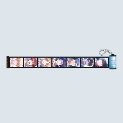 Debut or Die Film Roll Keychain featuring anime character portraits on film strip design