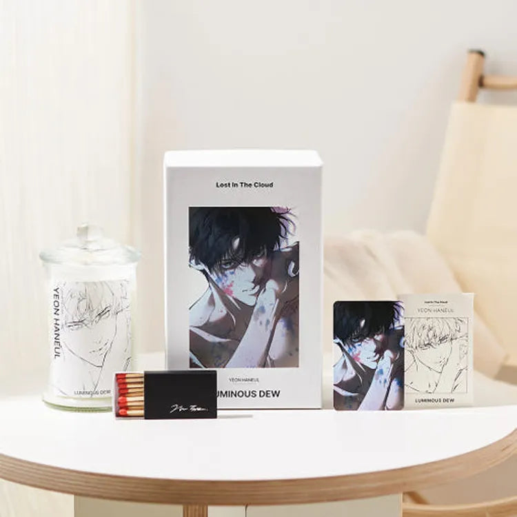 Lost in the Cloud Haneul Skylar Candle Set featuring artistic packaging and a clear glass jar candle