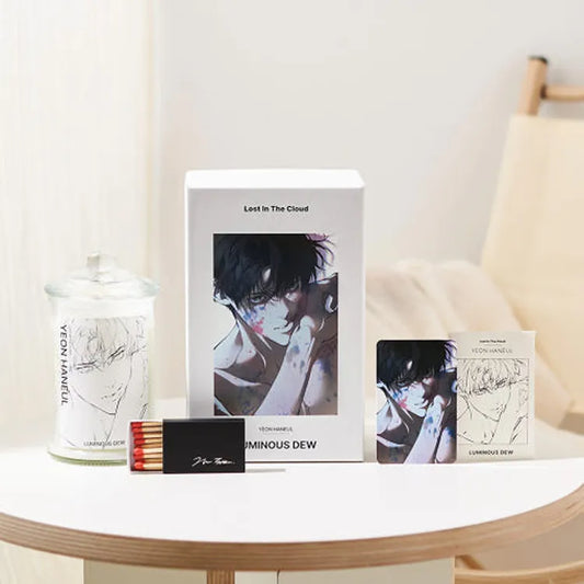 Lost in the Cloud Haneul Skylar Candle Set featuring artistic packaging and a clear glass jar candle