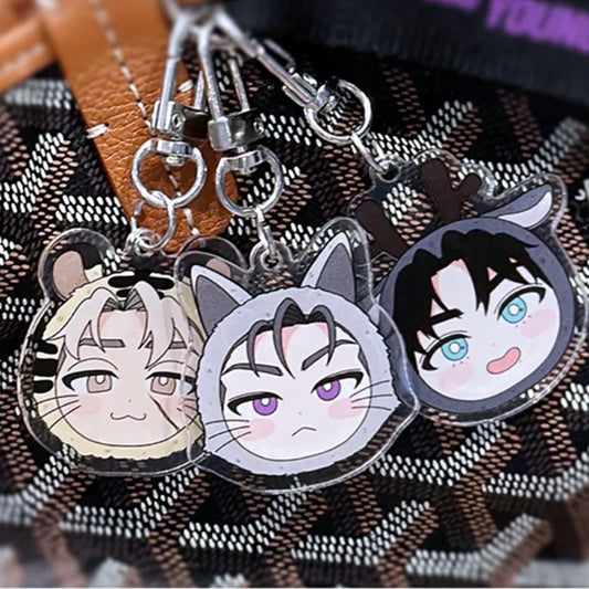 Wet Sand keychain set featuring character keyrings of Ian, Joseph, and TJ attached to a bag.